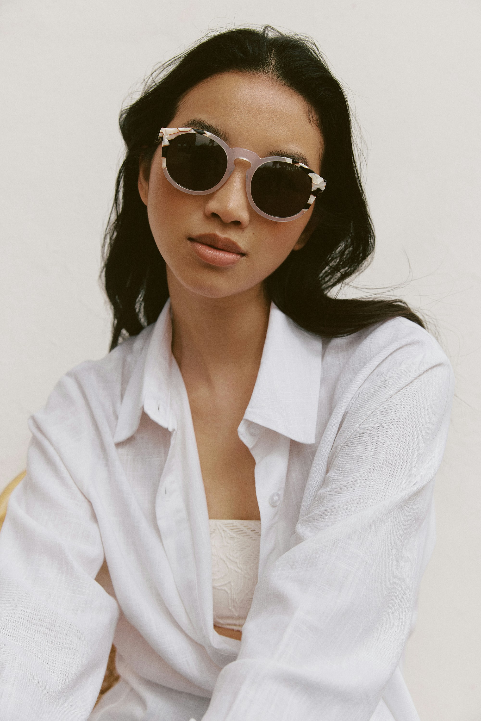 Marbled sunglasses with dark lenses