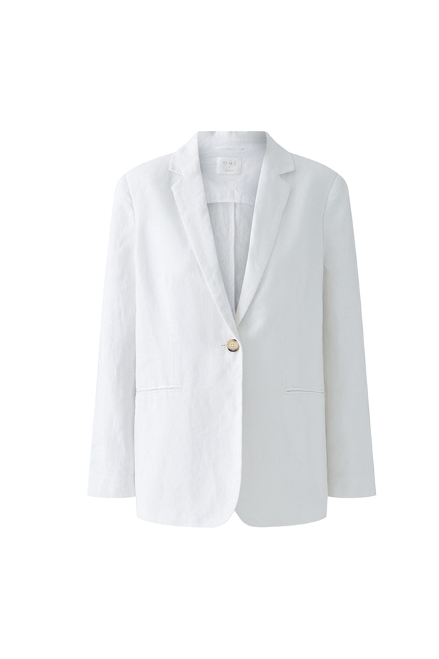 A white one-button blazer in linen.