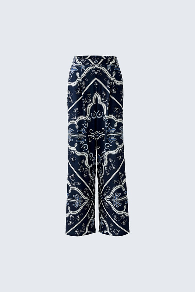 A pair of trousers in dark blue with a white print.