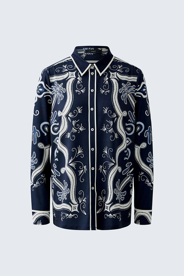 A blouse in dark blue with a white bandana print.