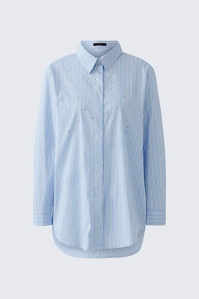 A blue and white striped blouse with glittering stones.