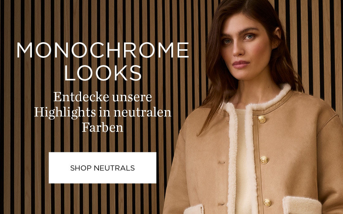 Eine Frau rechts mit einer beigen Jacket mit weißem flauschischen Kanten und goldenen Schmuckknöpfen, trägt darunter einen cremfarbenen Pullover. Links Schrift: Monochrome Looks - Entdecke unsere Highlights in neutralen Farben und eine Klickfläche: Shop Neutrals.