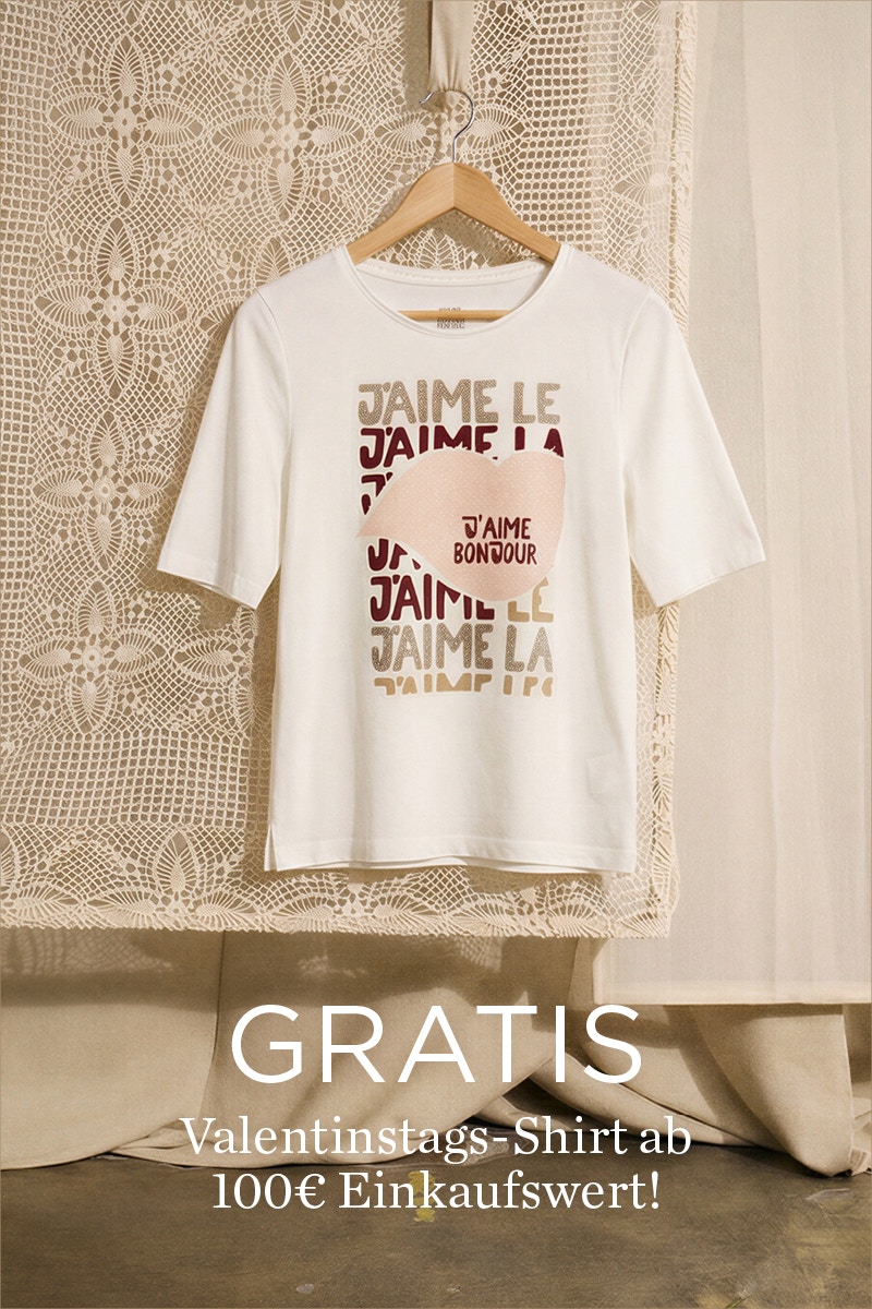 T-Shirt auf bügel in weiss mit rosa, rotem Druck mit Herz. Verweist auf eine Gratis aktion.