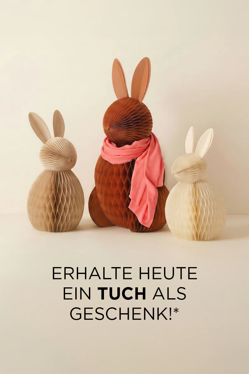 Drei Papierhasen in Beige, Rot und Orange darunter Text: erhalte heute ein Tuch als Geschenk!*