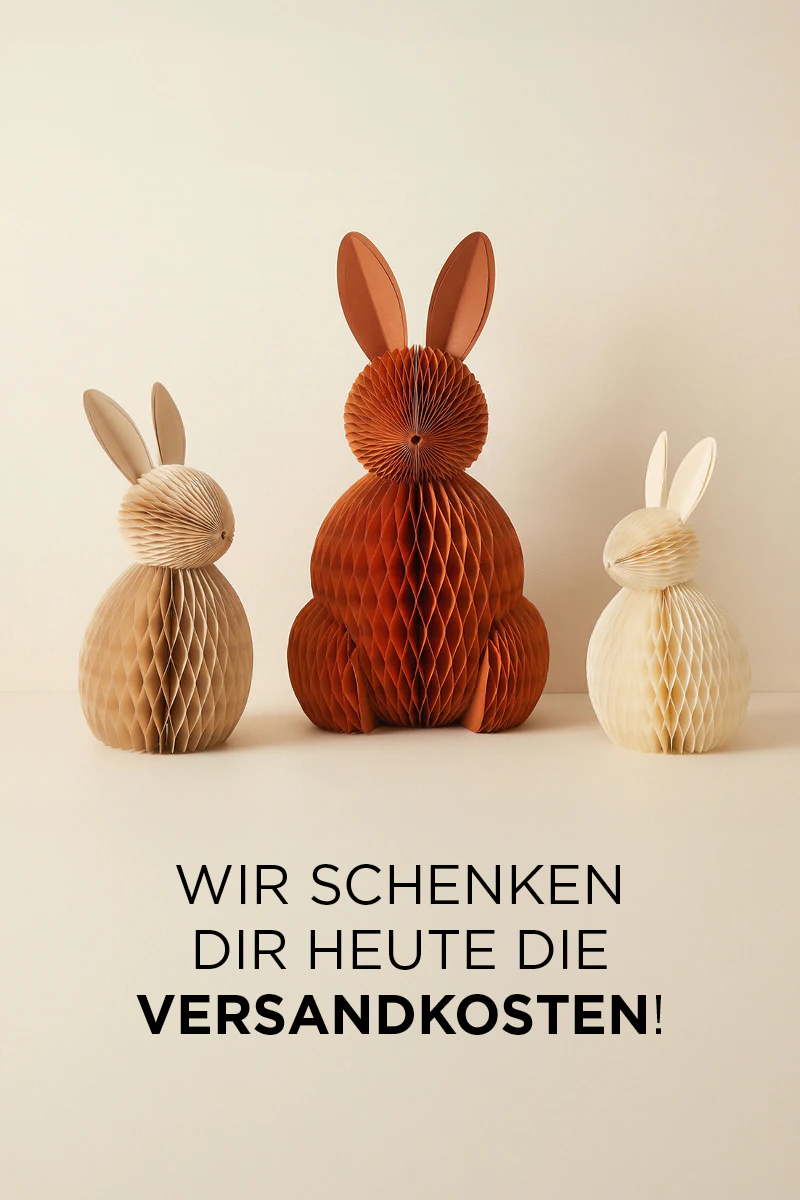 Drei Papierhasen in Beige, Rot und Orange darüber Text: Wir schenken dir heute die Versandkosten