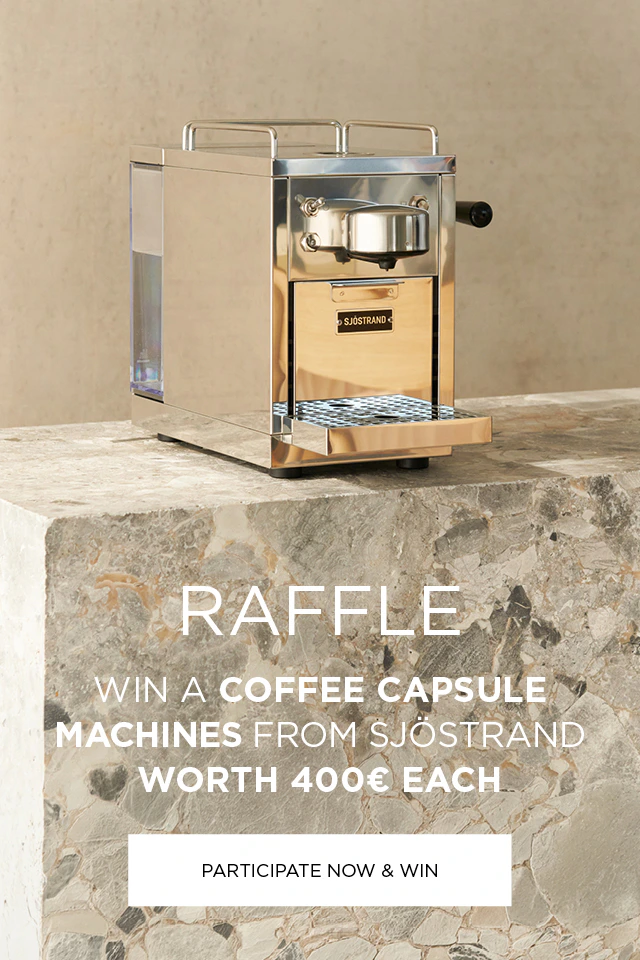 A metallic-coloured coffee machine with text: Competition – Win a Sjöstrand coffee capsule machine worth €400. Clickable area: Enter now and win