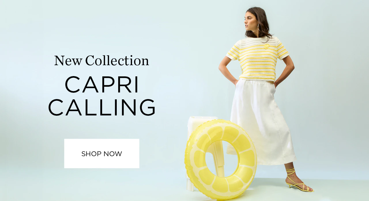 Model wearing a yellow striped top with a white midi skirt. A lemon-shaped rubber ring as a prop. Caption: New Capri Calling collection.