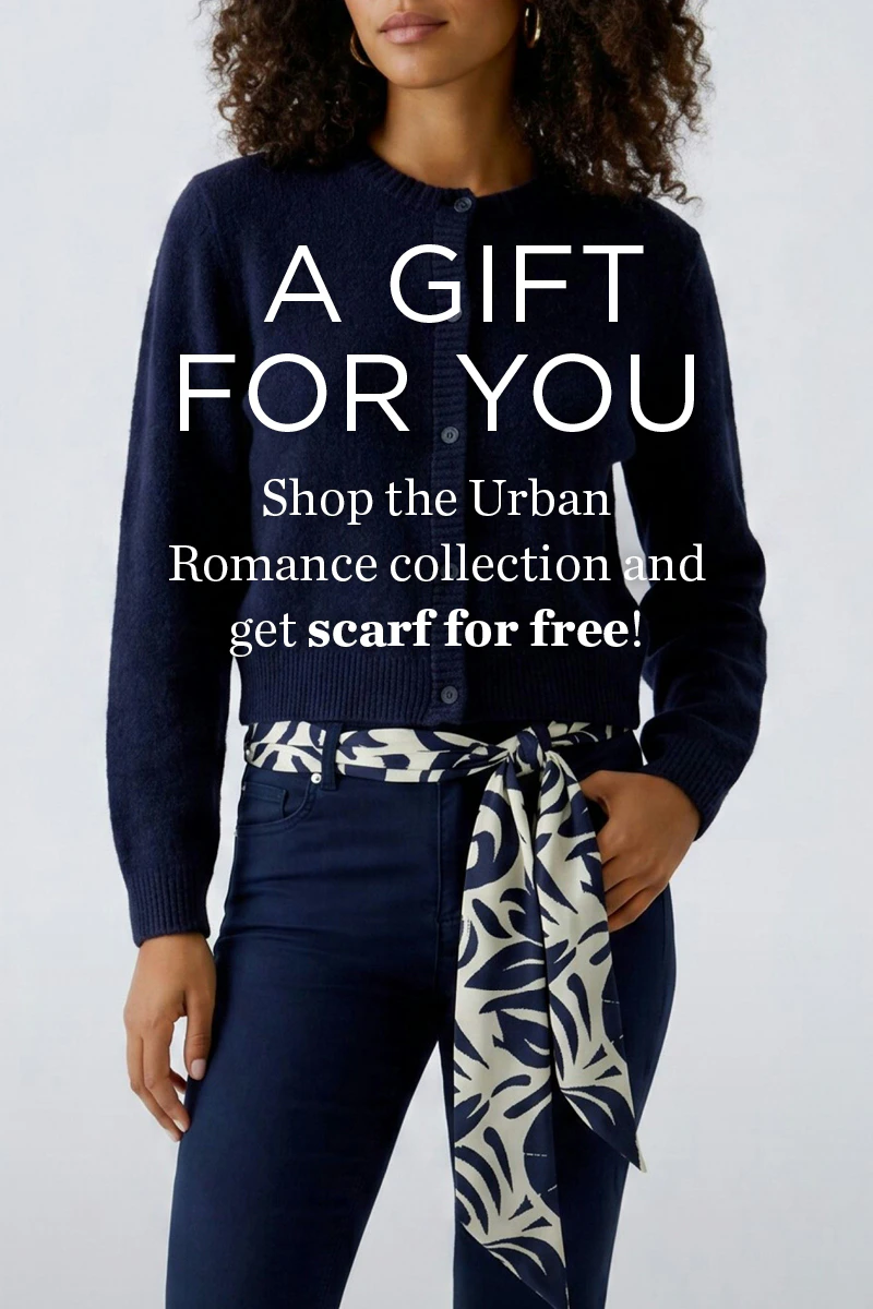 Promotional banner from Oui featuring a cardigan and trousers. Buy anything from the Urban Romance collection and get a scarf free.